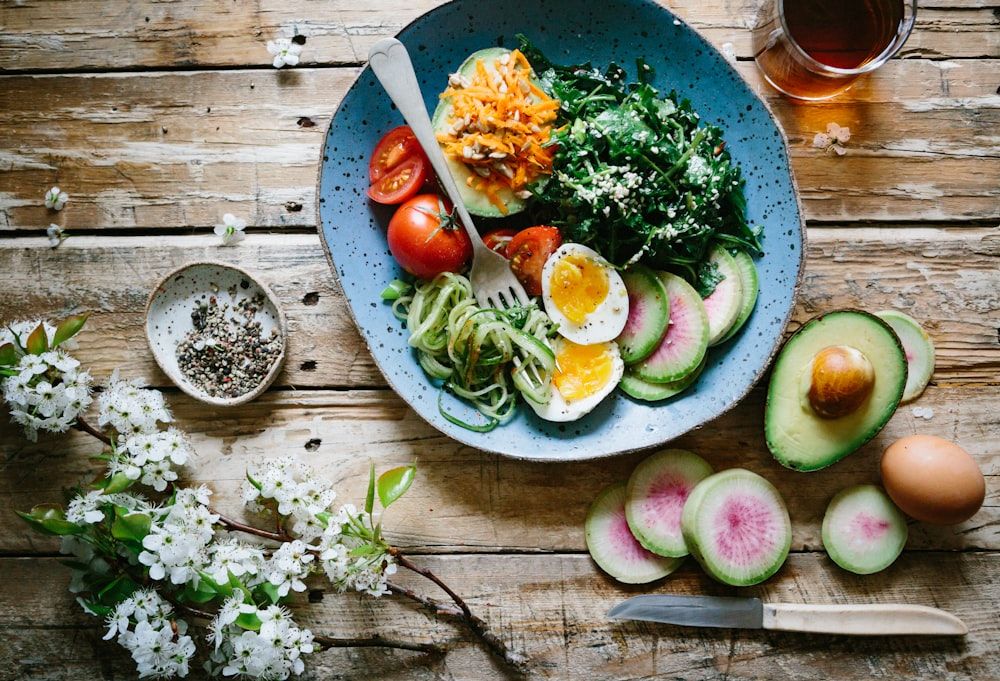A kitchen counter with a glass of water and a protein-forward breakfast.