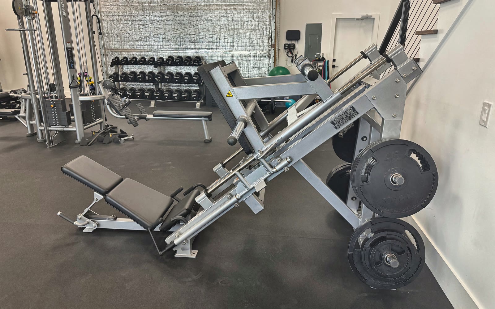 The leg press and strength equipment inside the Solstice studio.